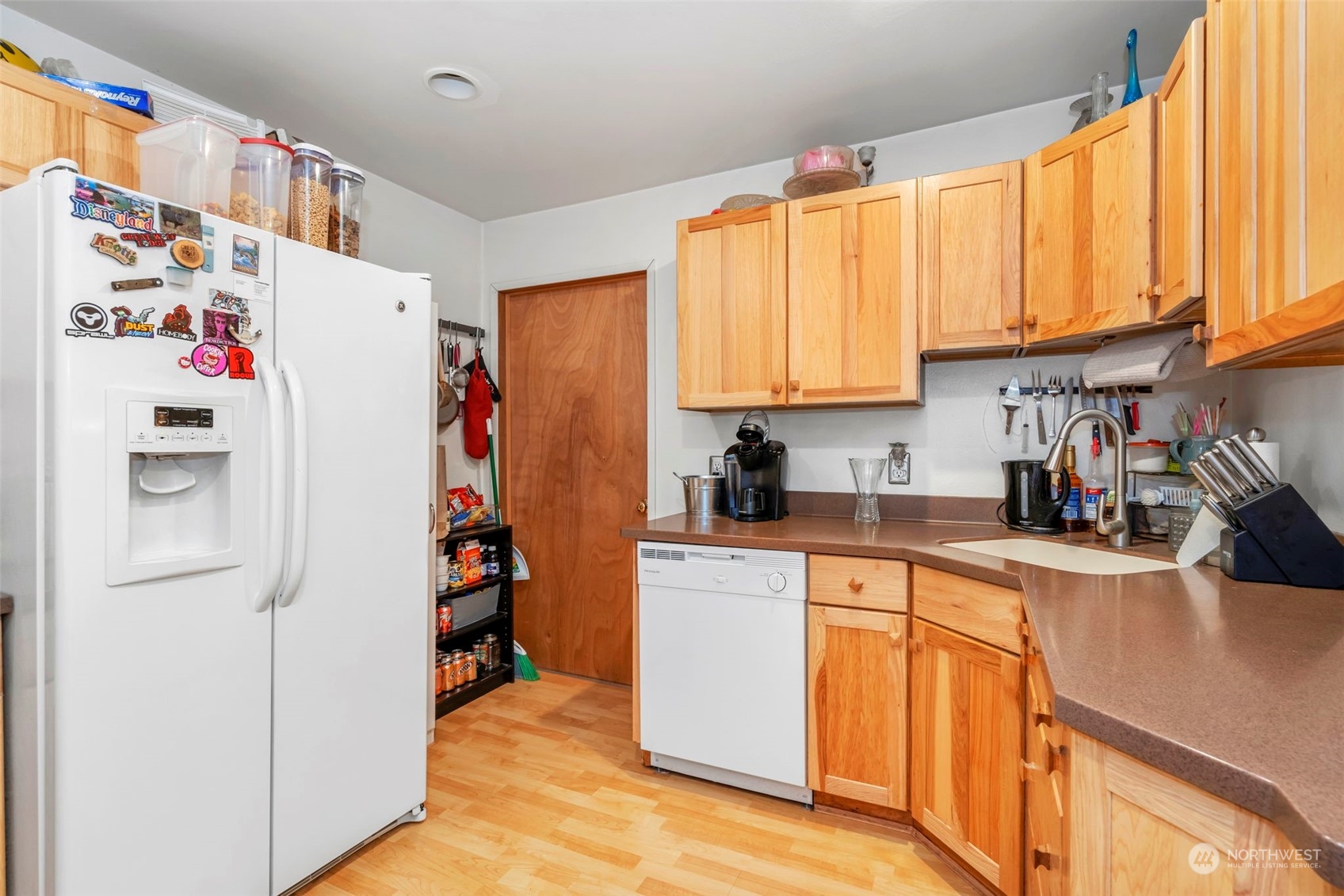 5807 Lowell Road Everett, WA 98203 - Photo 11 of 30 a kitchen with stainless steel appliances a refrigerator and a sink