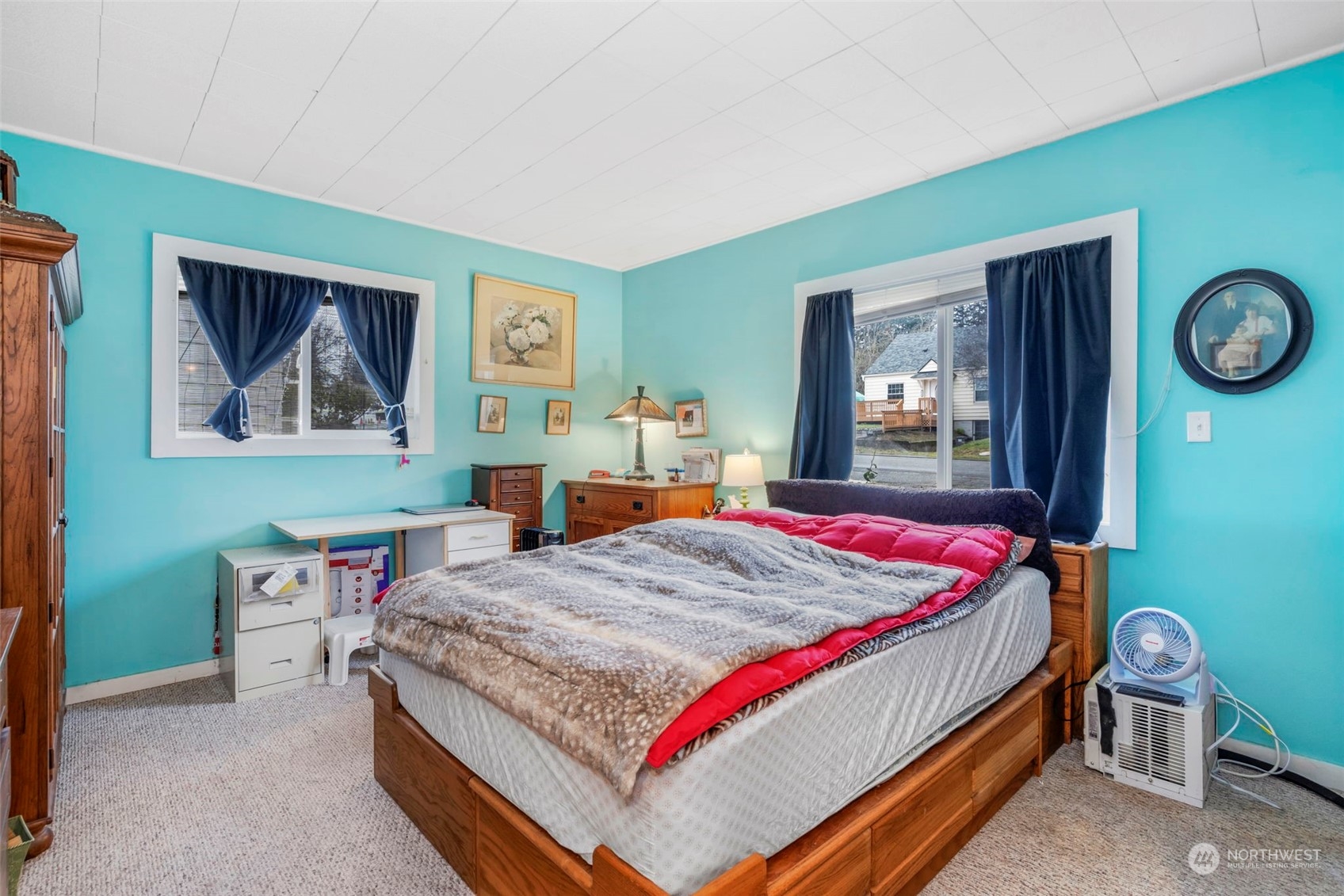 5807 Lowell Road Everett, WA 98203 - Photo 13 of 30 a bedroom with a bed and a table in it