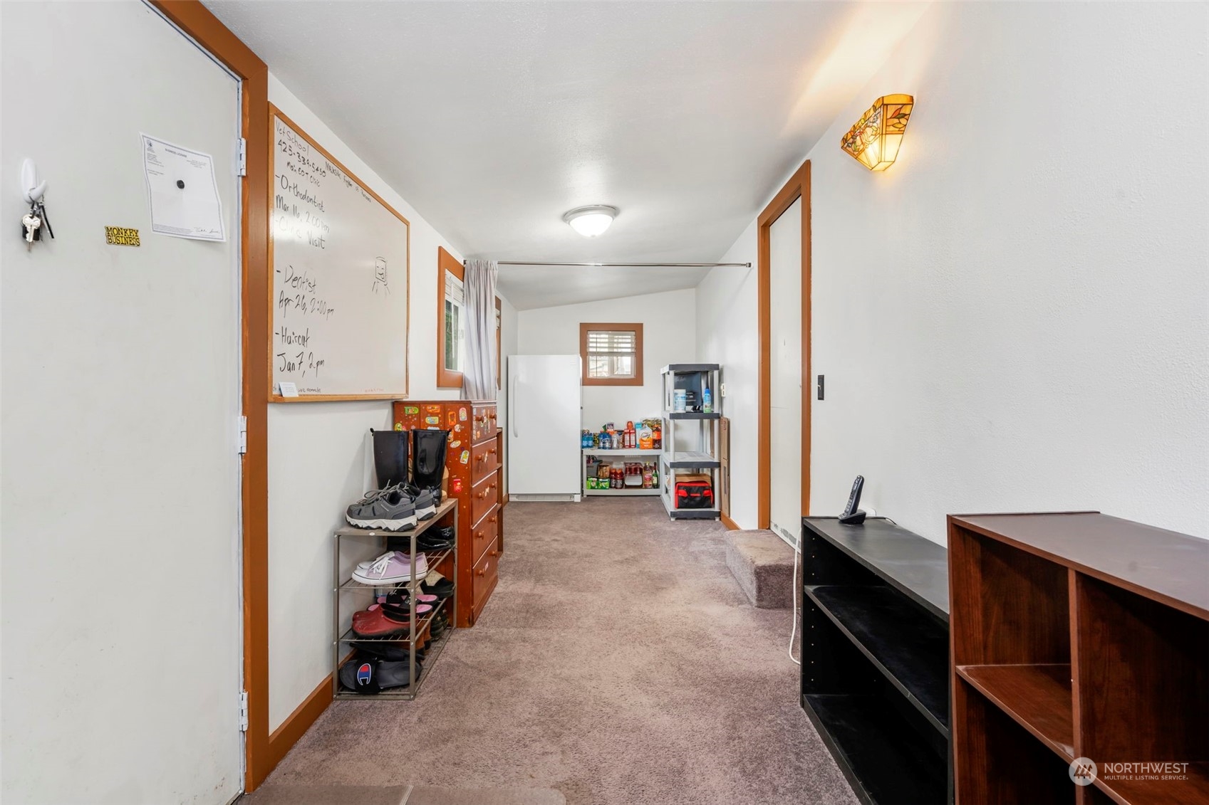 5807 Lowell Road Everett, WA 98203 - Photo 20 of 30 a view of a hallway with workspace and a window