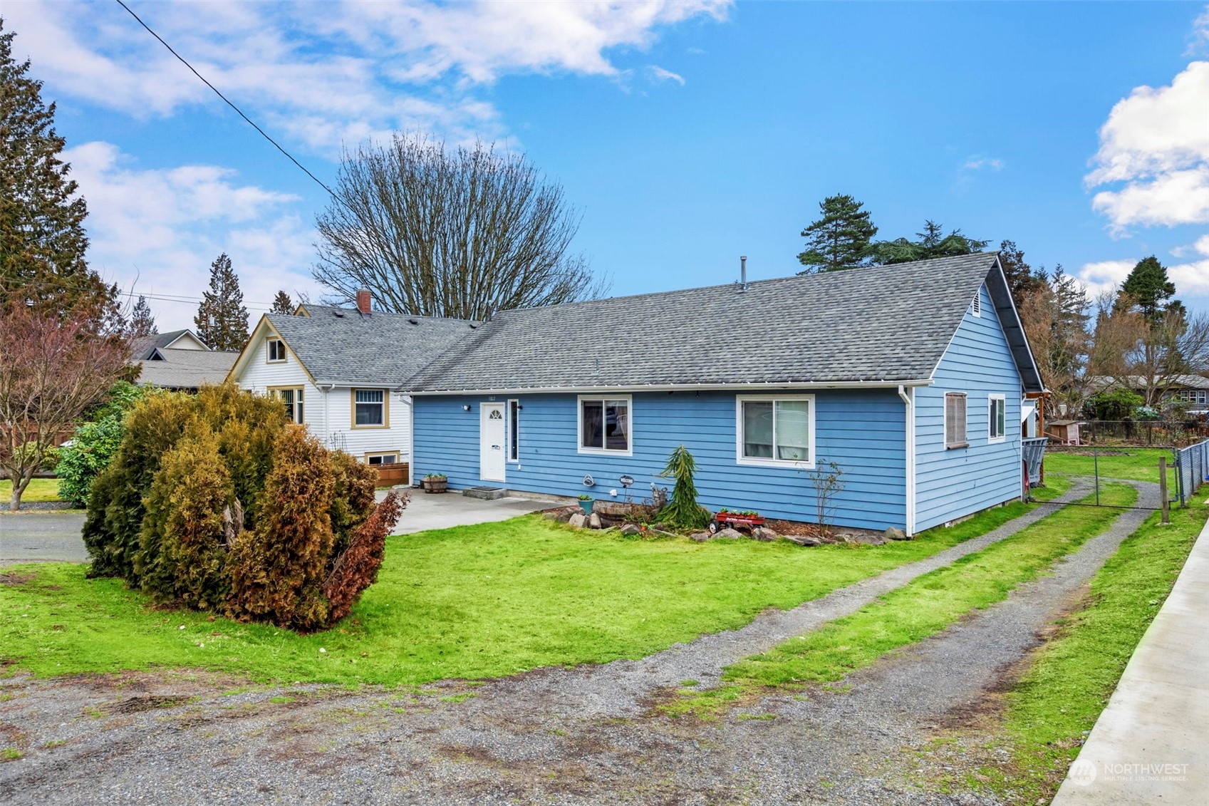 5807 Lowell Road Everett, WA 98203 - Photo 2 of 30 a view of a yard in front of house