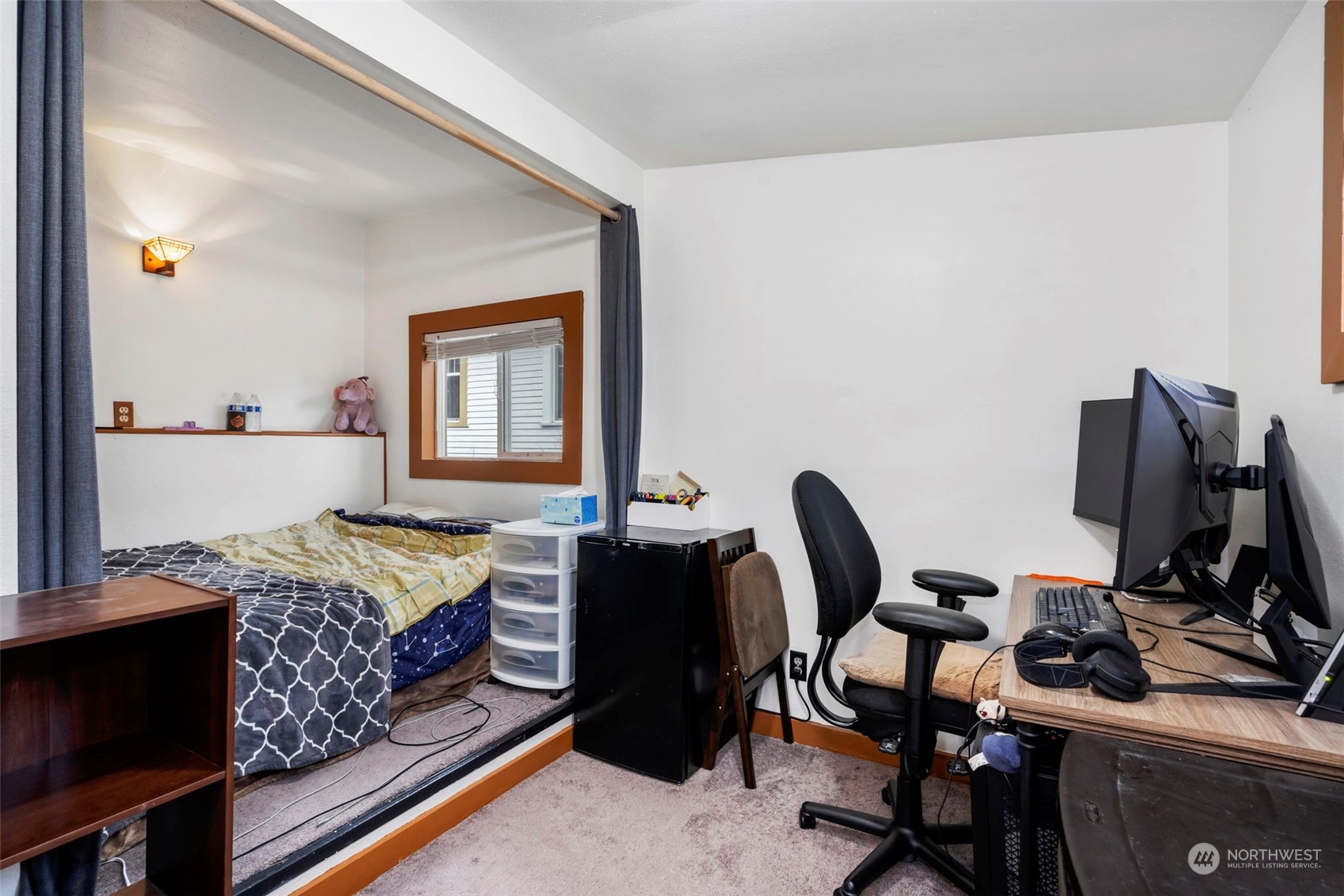 5807 Lowell Road Everett, WA 98203 - Photo 21 of 30 a bedroom with a bed and a desk