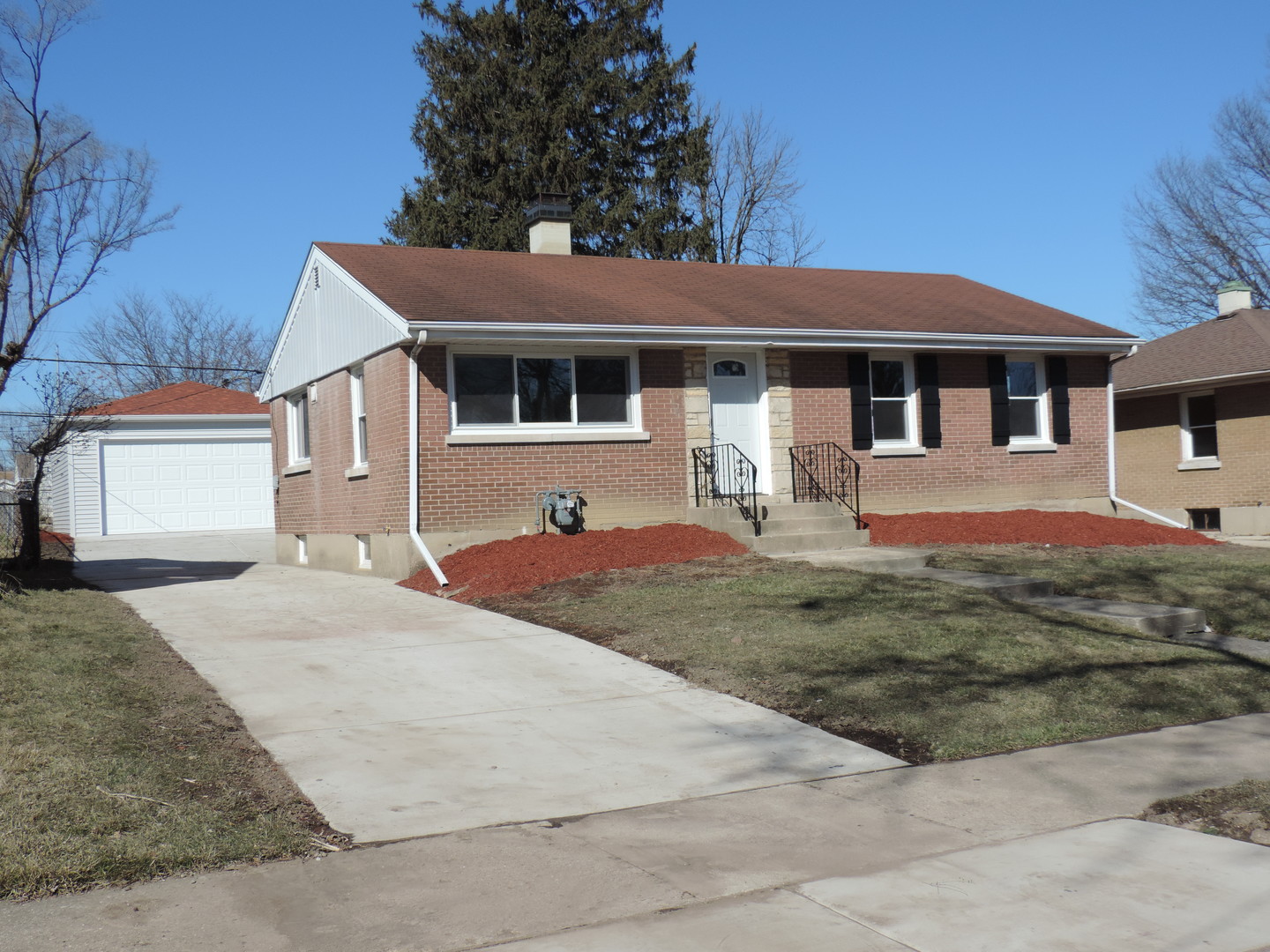 1532 Herbert Avenue Berkeley, IL 60163 - Photo 1 of 1 a front view of a house with garden