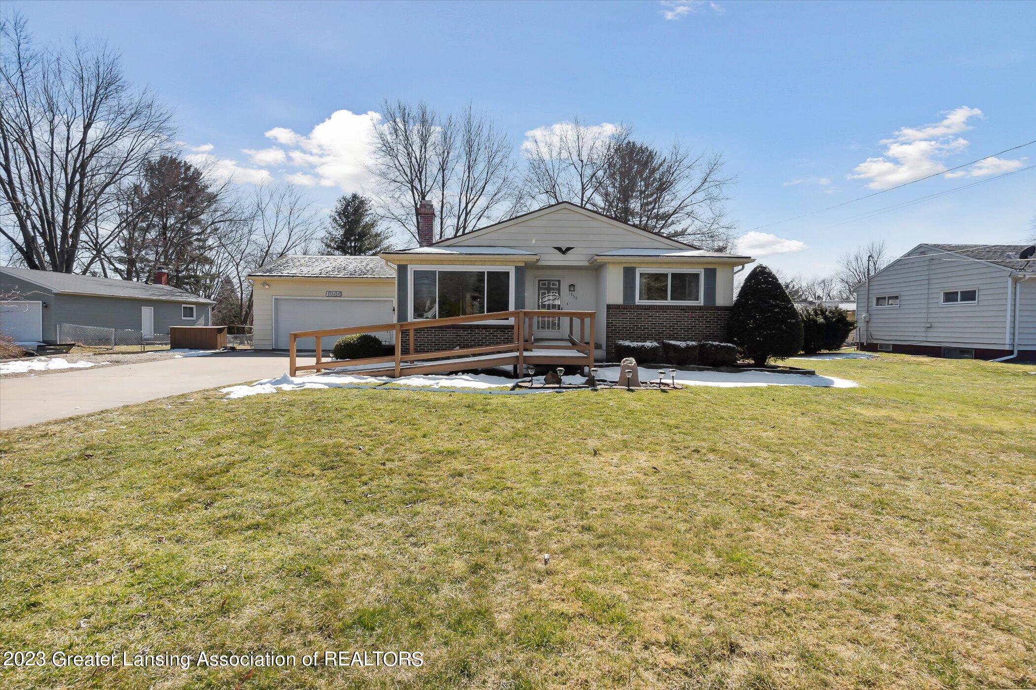 1355 West Webb Road Dewitt, MI 48820 - Photo 1 of 15 Front