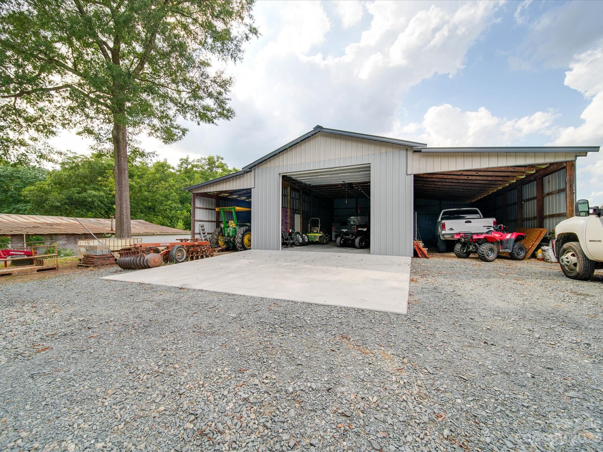 5817 Unionville Road Monroe, NC 28110 - Photo 19 of 46 a view of car parked in front of garage