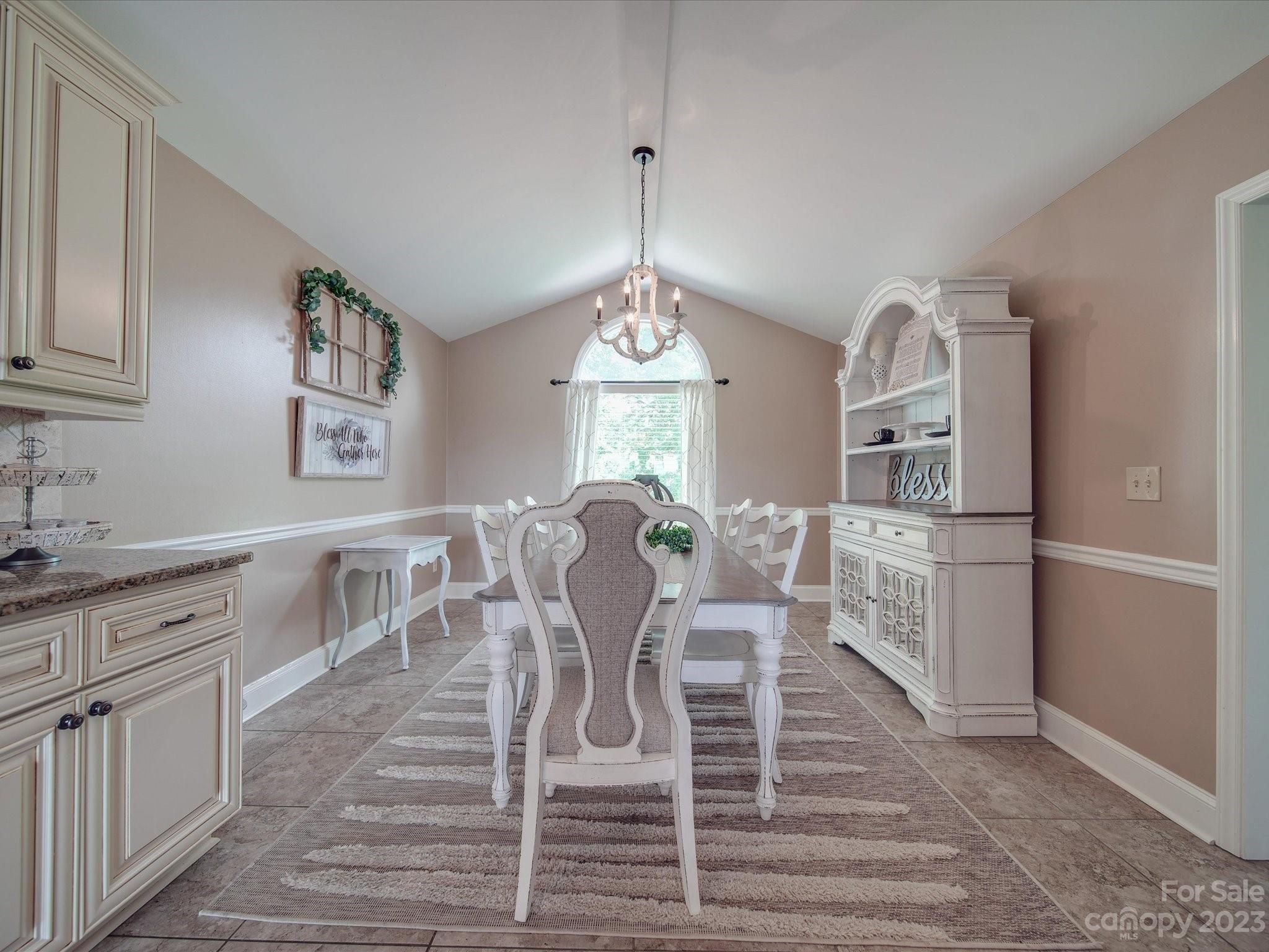 5817 Unionville Road Monroe, NC 28110 - Photo 27 of 46 a view of a dining room with furniture window and wooden floor