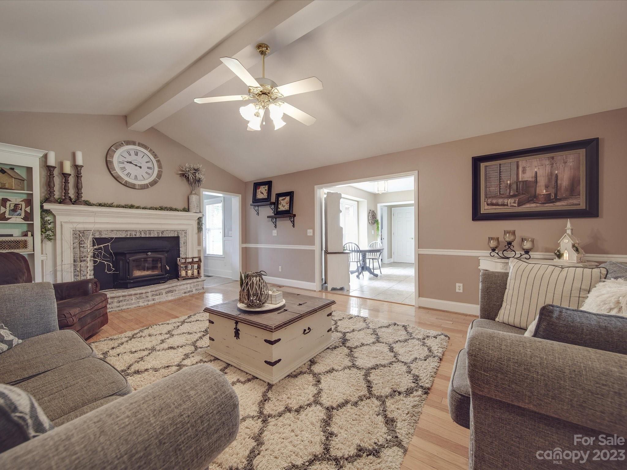 5817 Unionville Road Monroe, NC 28110 - Photo 30 of 46 a living room with furniture and a fireplace