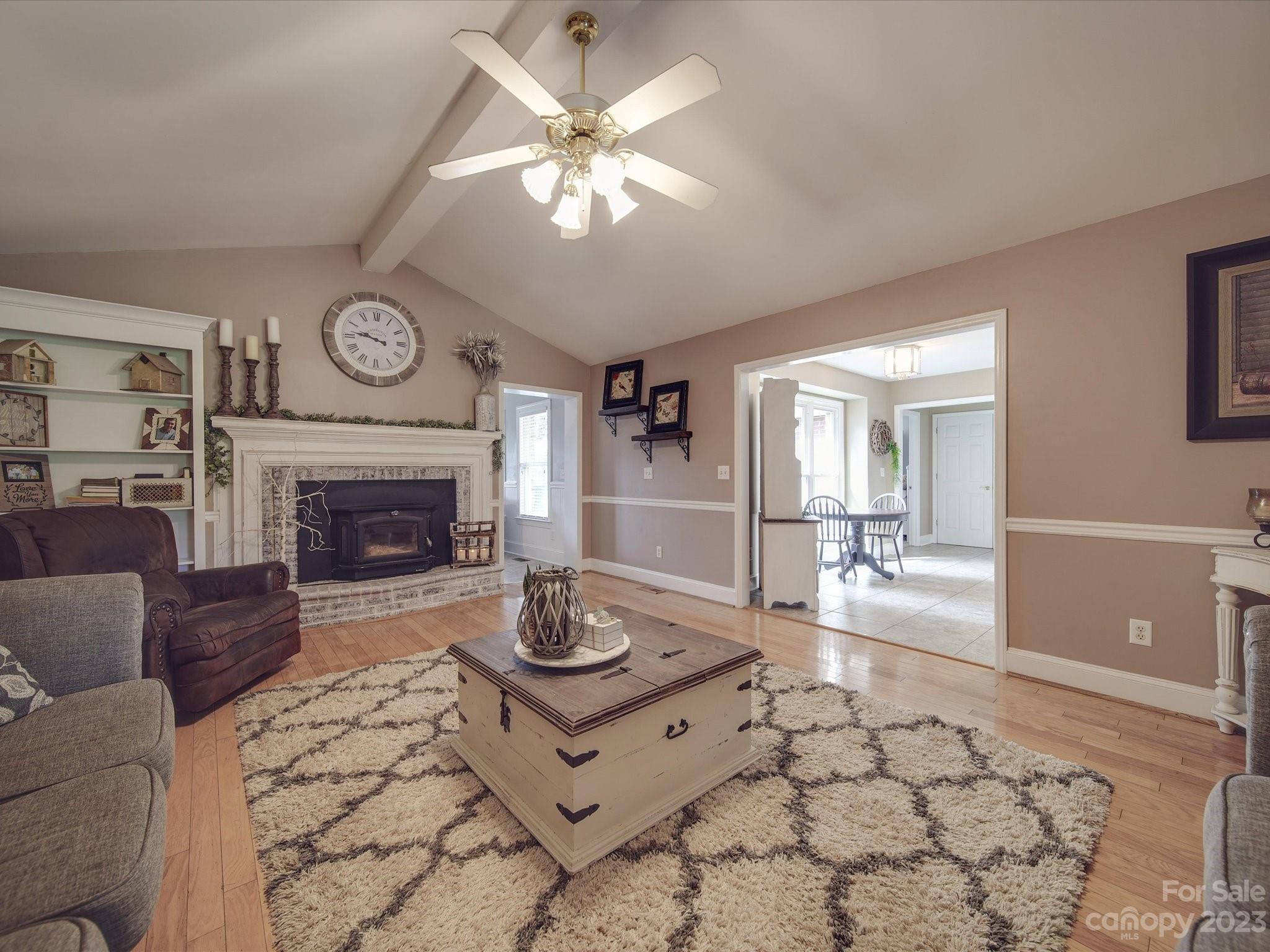 5817 Unionville Road Monroe, NC 28110 - Photo 33 of 46 a living room with furniture and a fireplace