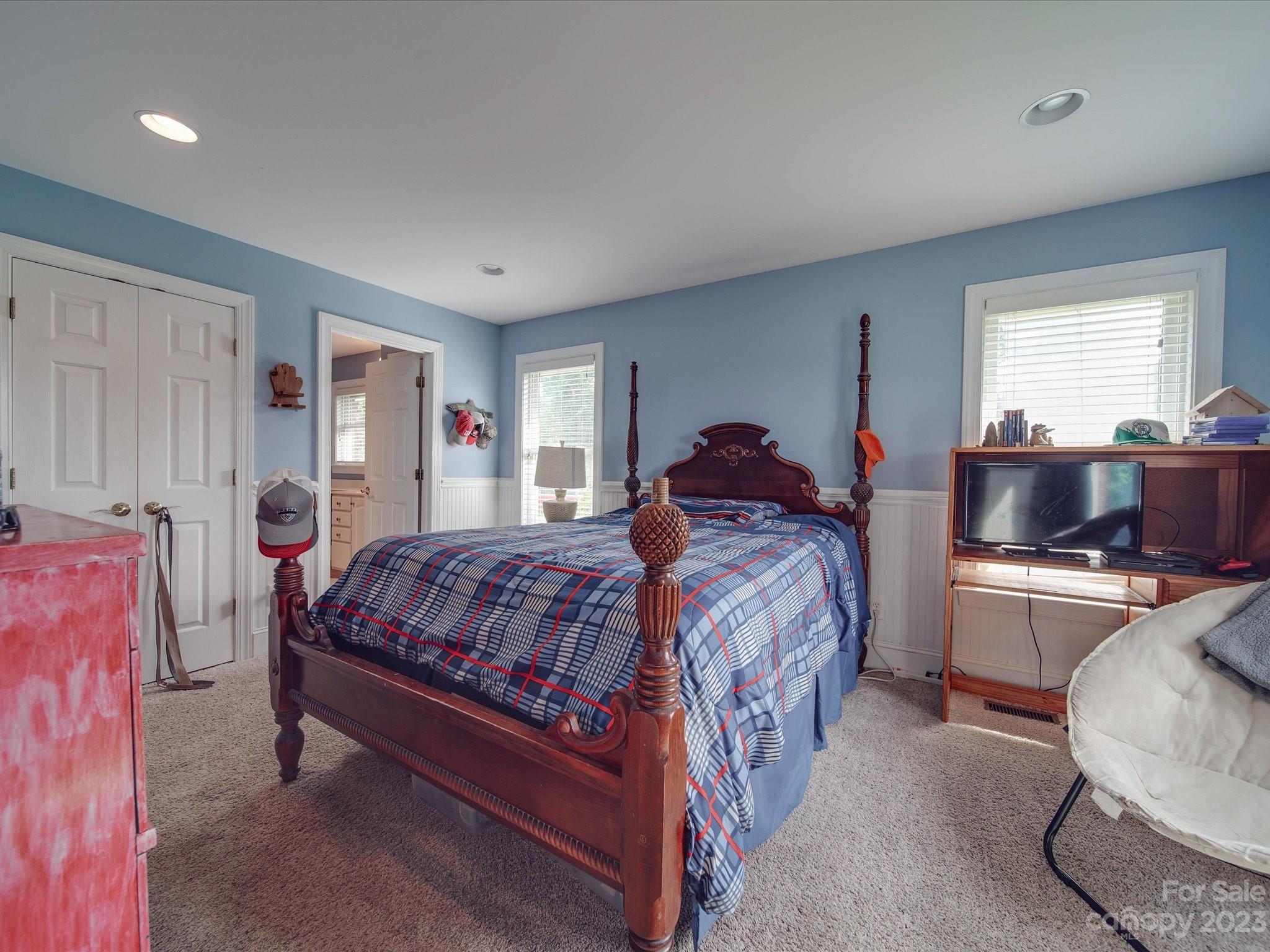 5817 Unionville Road Monroe, NC 28110 - Photo 42 of 46 a bedroom with a bed and a dresser