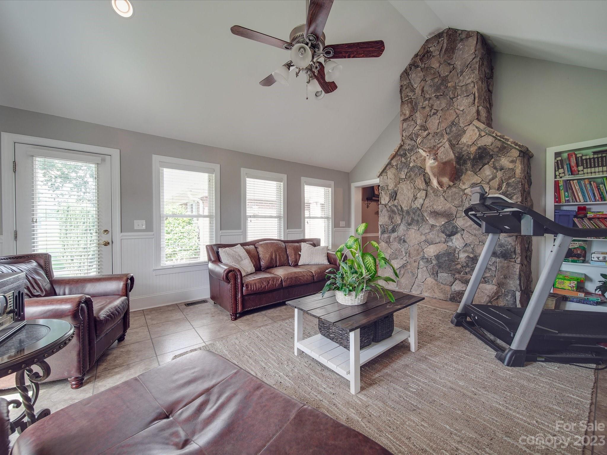 5817 Unionville Road Monroe, NC 28110 - Photo 44 of 46 a living room with furniture and a wooden floor