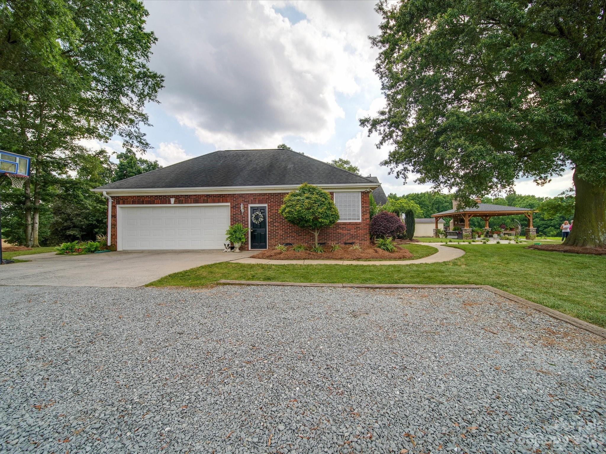 5817 Unionville Road Monroe, NC 28110 - Photo 8 of 46 a view of house with outdoor space and street view