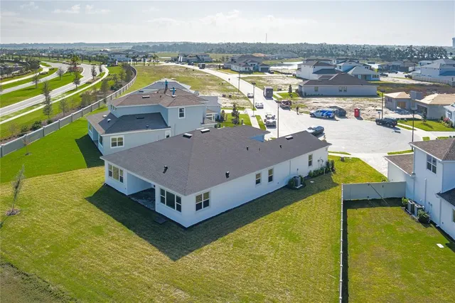 a view of a house with a ocean view
