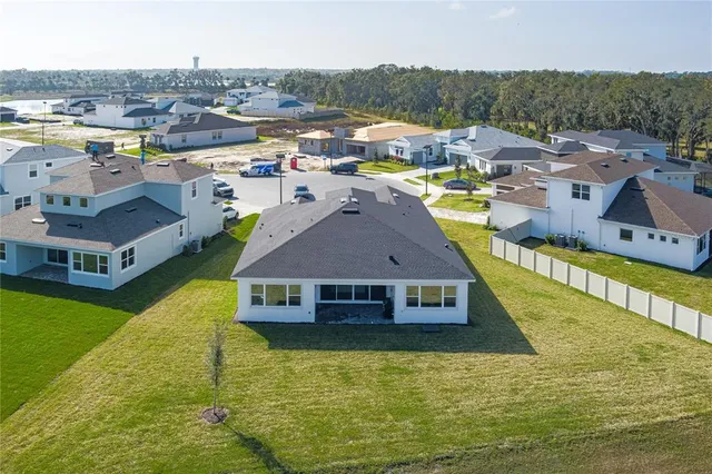 a view of a house with a ocean view