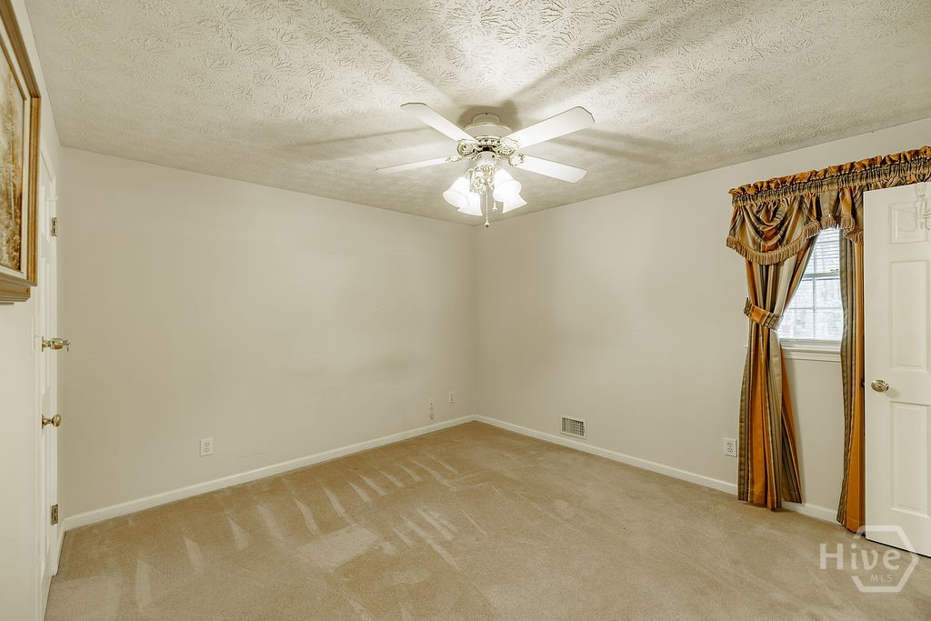 1296 Lake Lucerne Road Southwest Lilburn, GA 30047 - Photo 26 of 57 Primary Bedroom View 1