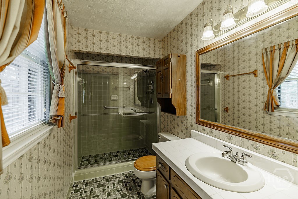 1296 Lake Lucerne Road Southwest Lilburn, GA 30047 - Photo 28 of 57 Primary Bathroom