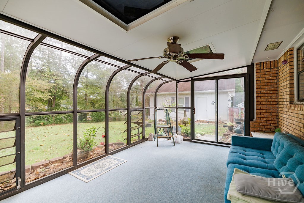 1296 Lake Lucerne Road Southwest Lilburn, GA 30047 - Photo 35 of 57 Sunroom View 1