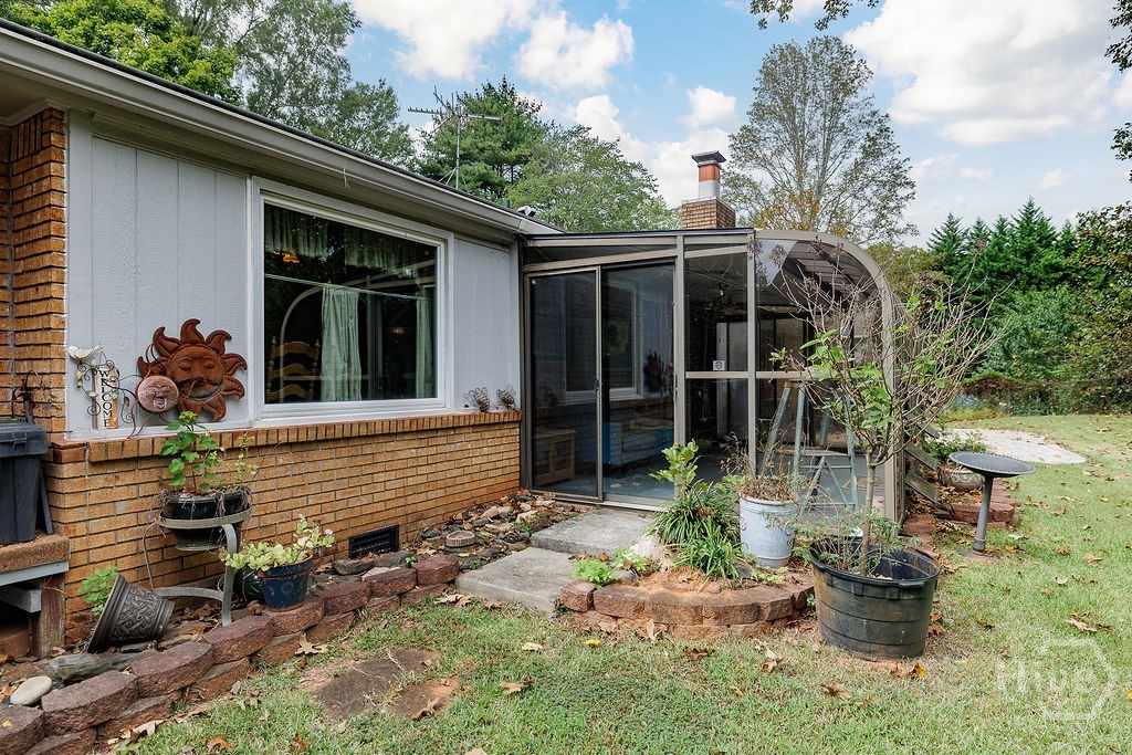 1296 Lake Lucerne Road Southwest Lilburn, GA 30047 - Photo 47 of 57 Back of Home Towards Sunroom