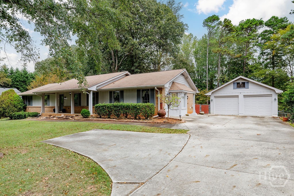 1296 Lake Lucerne Road Southwest Lilburn, GA 30047 - Photo 49 of 57 Front of Home From Driveway