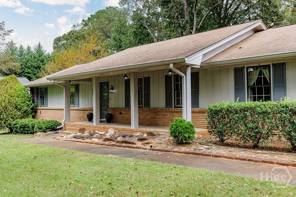 1296 Lake Lucerne Road Southwest Lilburn, GA 30047 - Photo 50 of 57 Front of Home View 2