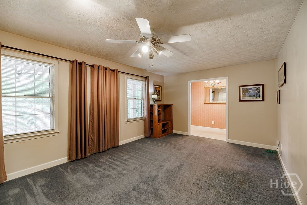 1296 Lake Lucerne Road Southwest Lilburn, GA 30047 - Photo 5 of 57 Formal Living Room / Dining Room View 1