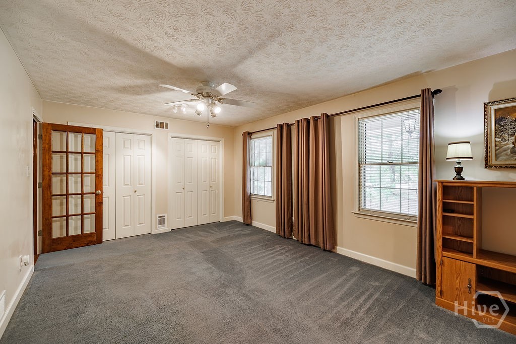 1296 Lake Lucerne Road Southwest Lilburn, GA 30047 - Photo 6 of 57 Formal Living Room / Dining Room View 2