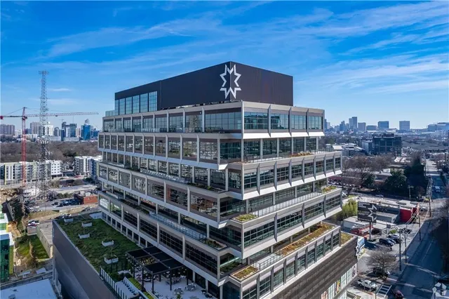 a sign on the side of a street