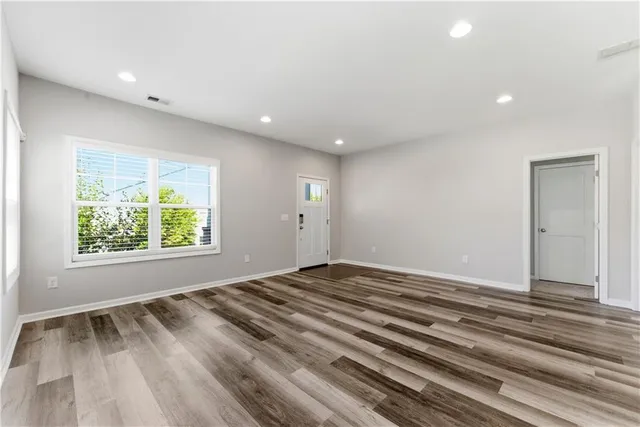 a view of an empty room and window