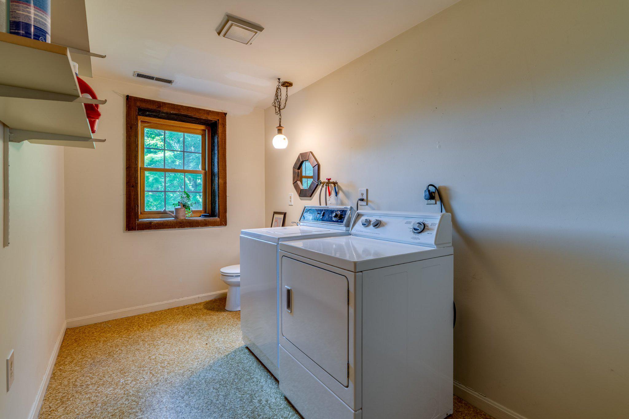 12 Buck Heights Road Holtwood, PA 17532 - Photo 30 of 42 Half bath with laundry. Washer and dryer included