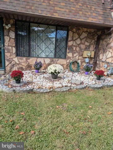 a view of swimming pool with outdoor seating