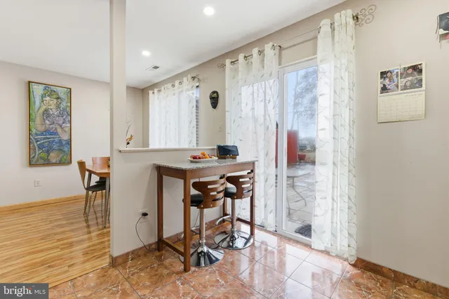 a workspace with furniture and a window