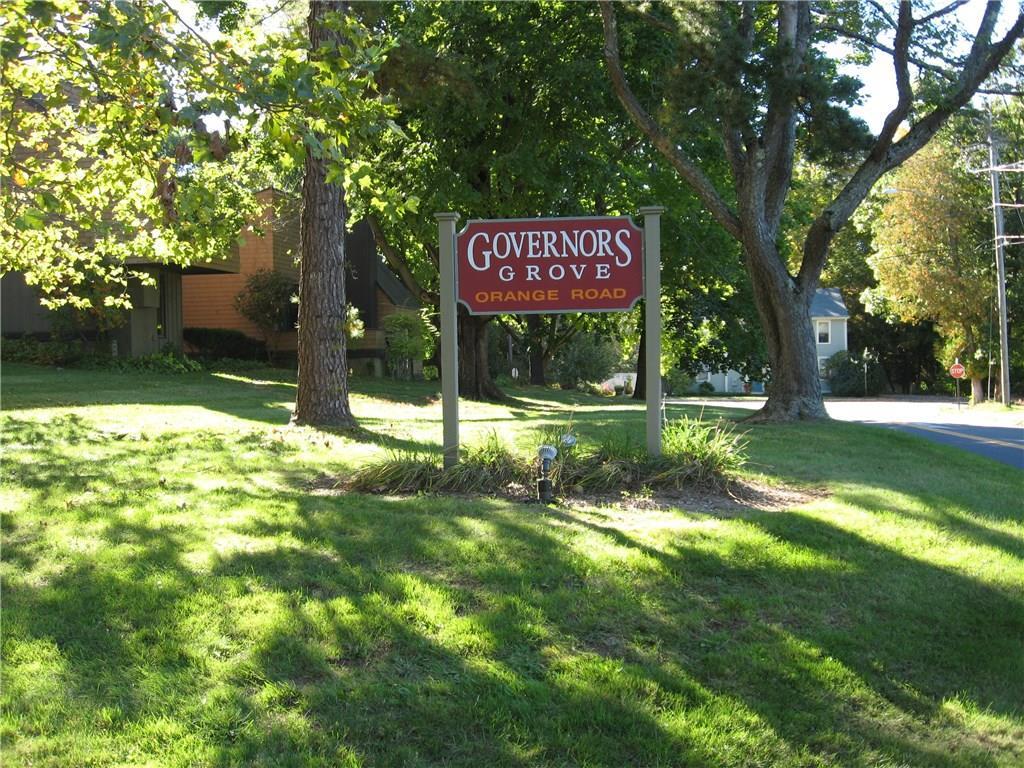 22 Orange Road, Unit 22 Middletown, CT 06457 - Photo 1 of 1 a view of an entrance to house with yard and green space
