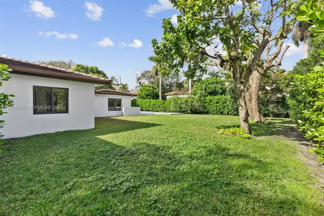a house view with a garden space