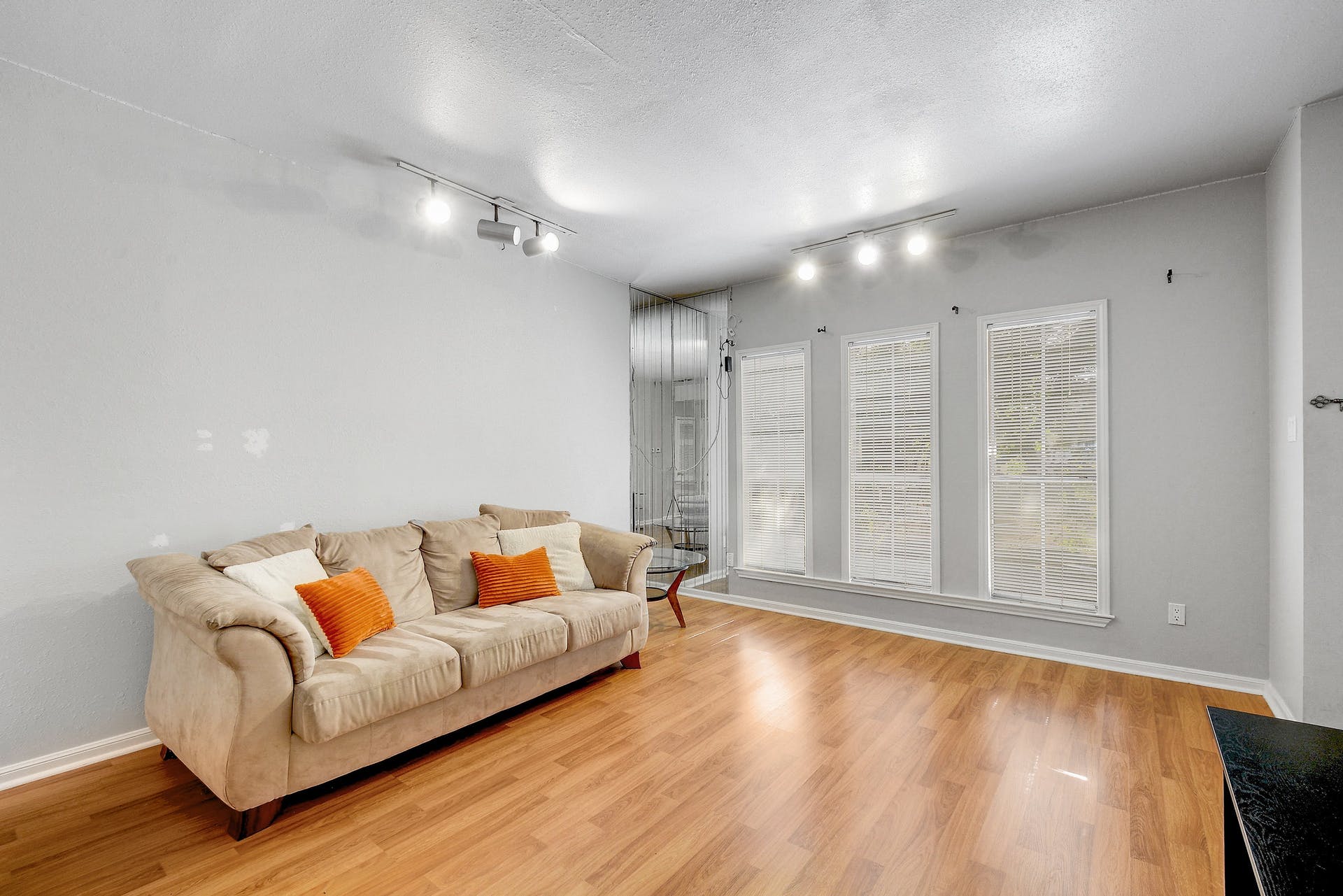 2529 Rio Grande Street, Unit 12 Austin, TX 78705 - Photo 11 of 25 a living room with furniture and a large window