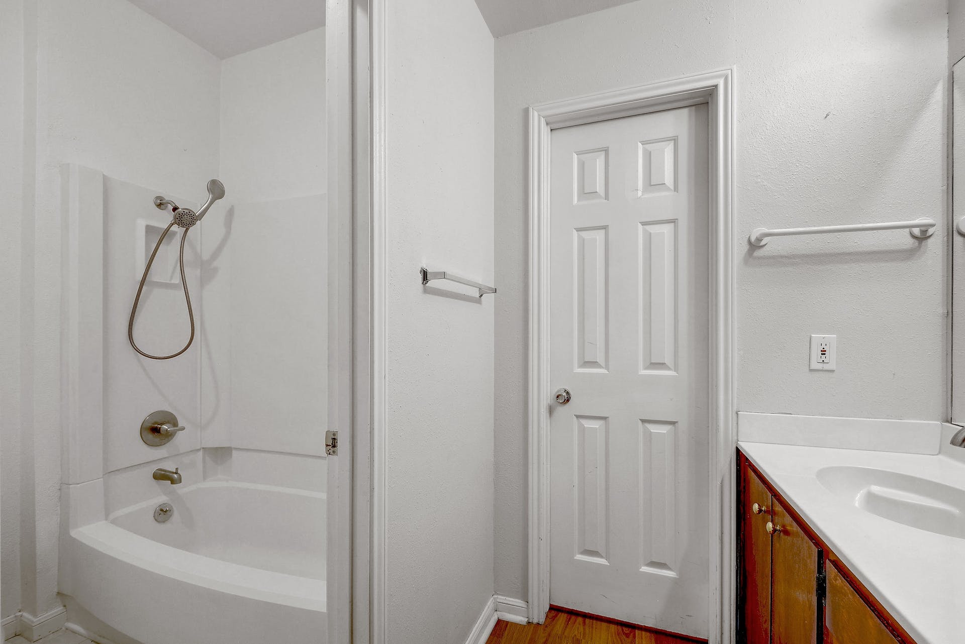 2529 Rio Grande Street, Unit 12 Austin, TX 78705 - Photo 20 of 25 a bathroom with a tub sink vanity and shower
