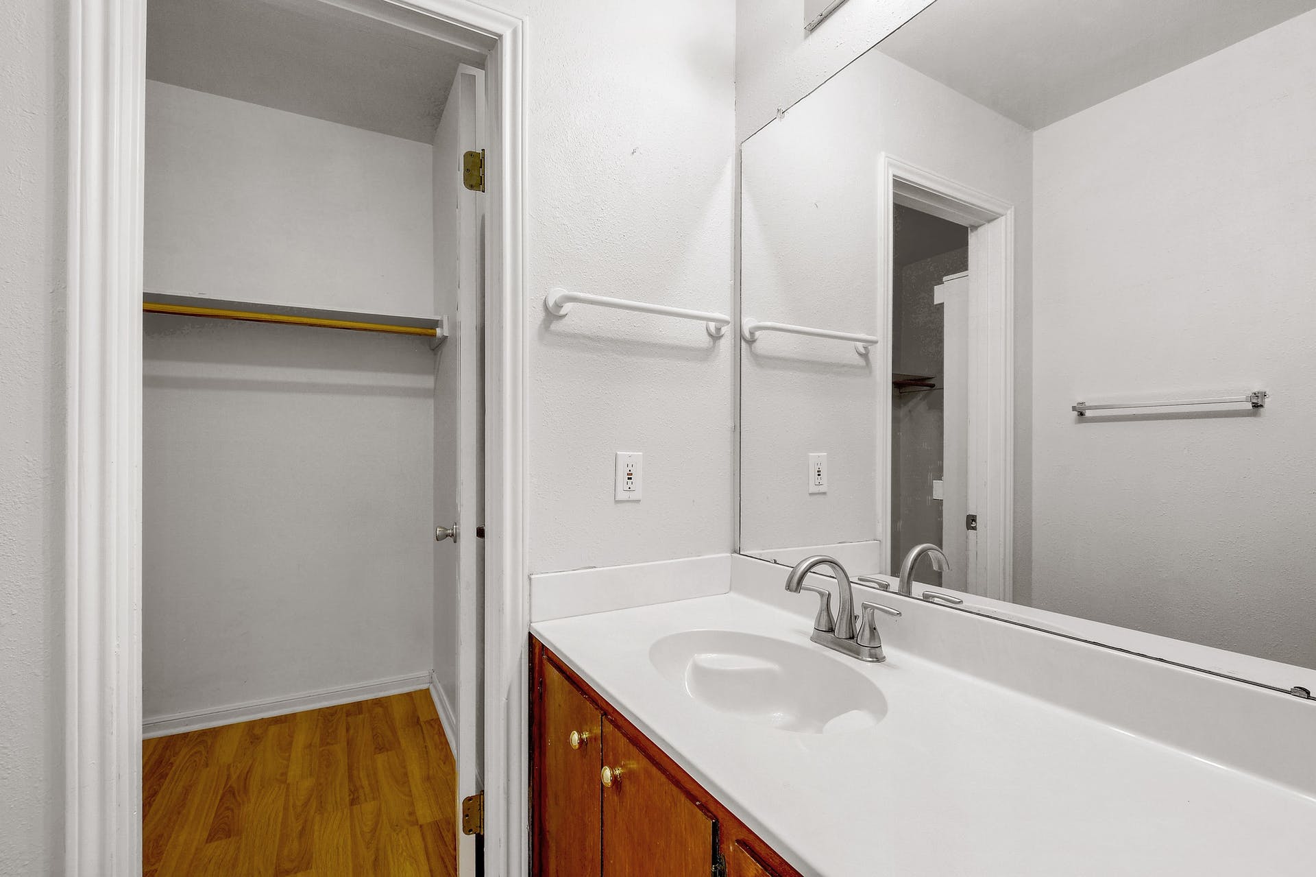 2529 Rio Grande Street, Unit 12 Austin, TX 78705 - Photo 21 of 25 a bathroom with a sink and a mirror