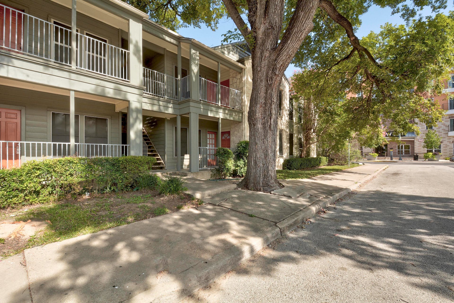 2529 Rio Grande Street, Unit 12 Austin, TX 78705 - Photo 25 of 25 a view of a building with a tree in front