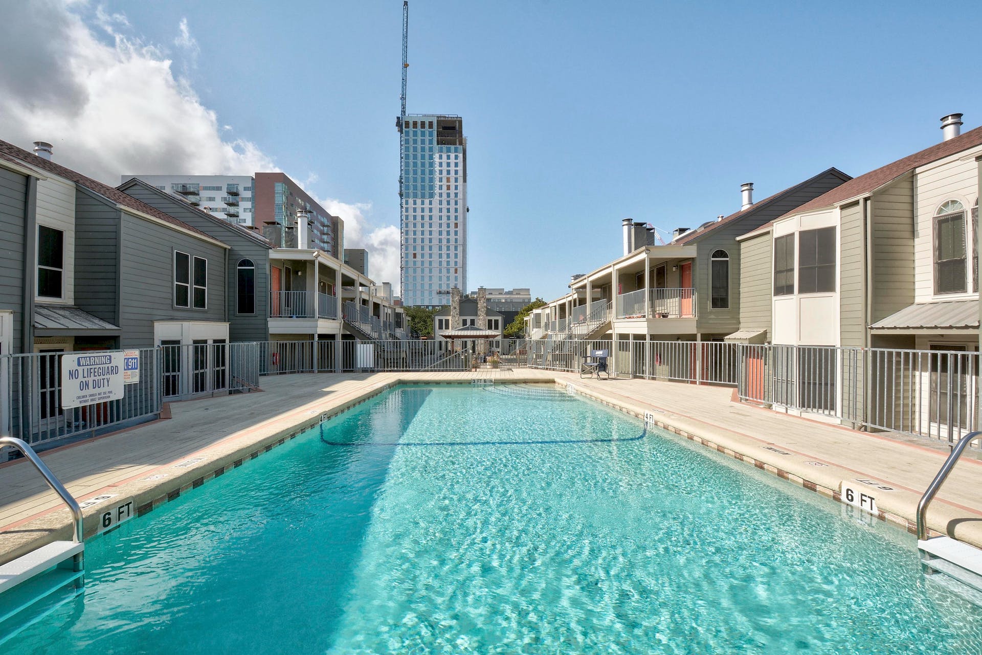 2529 Rio Grande Street, Unit 12 Austin, TX 78705 - Photo 6 of 25 a view of a house with a swimming pool