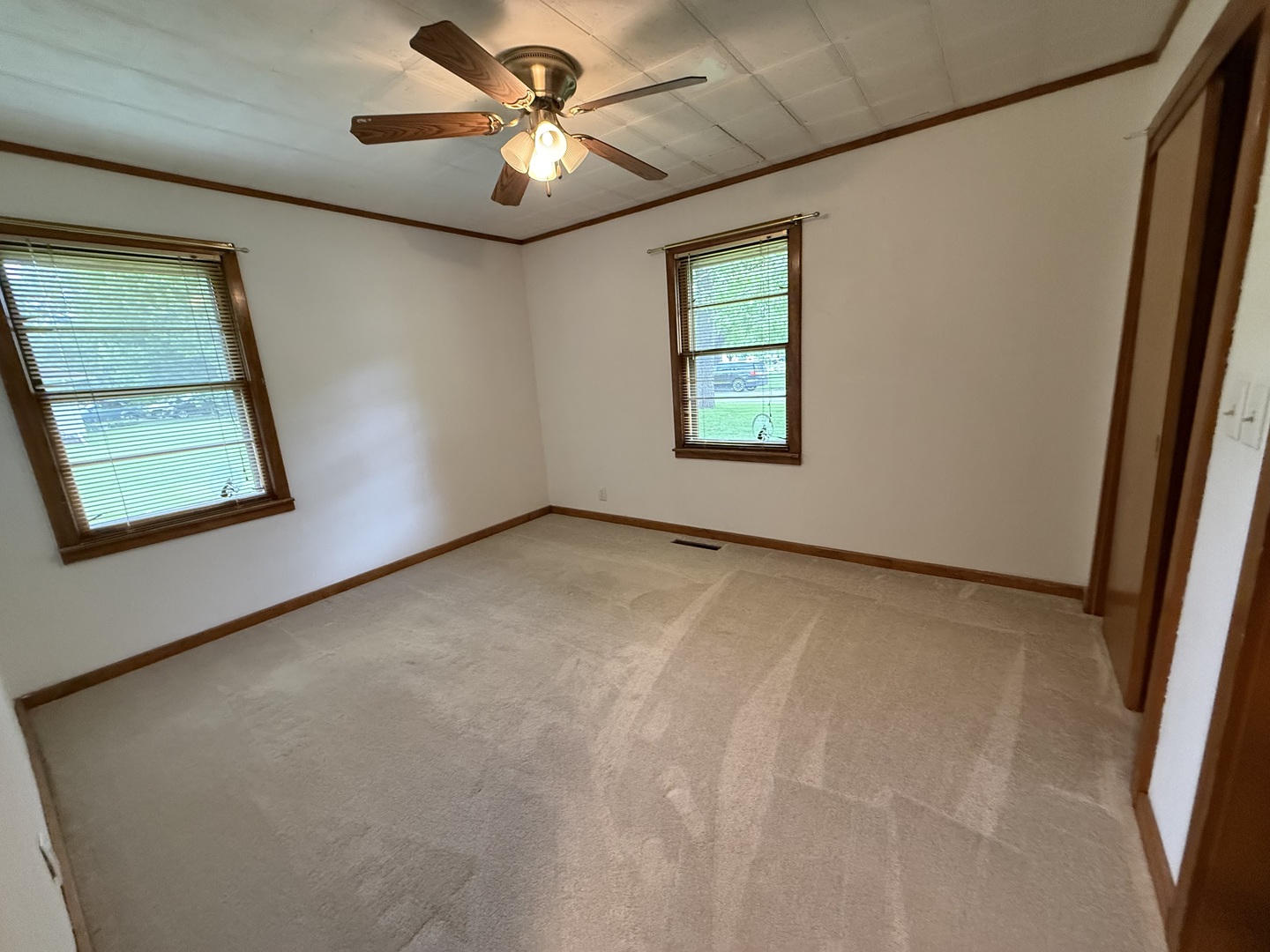 1048 Warren Street Henry, IL 61537 - Photo 17 of 26 a view of an empty room with a window