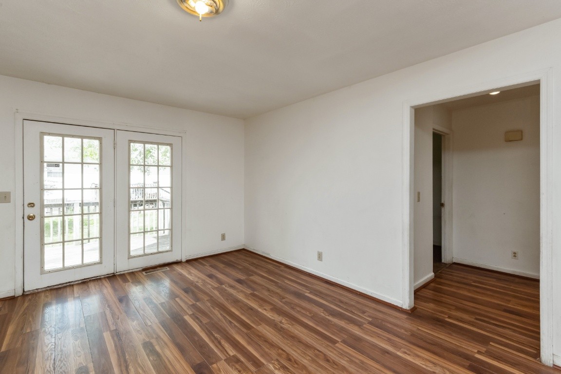 323 Bandera Lane Springfield, TN 37172 - Photo 11 of 33 wooden floor in an empty room with a window
