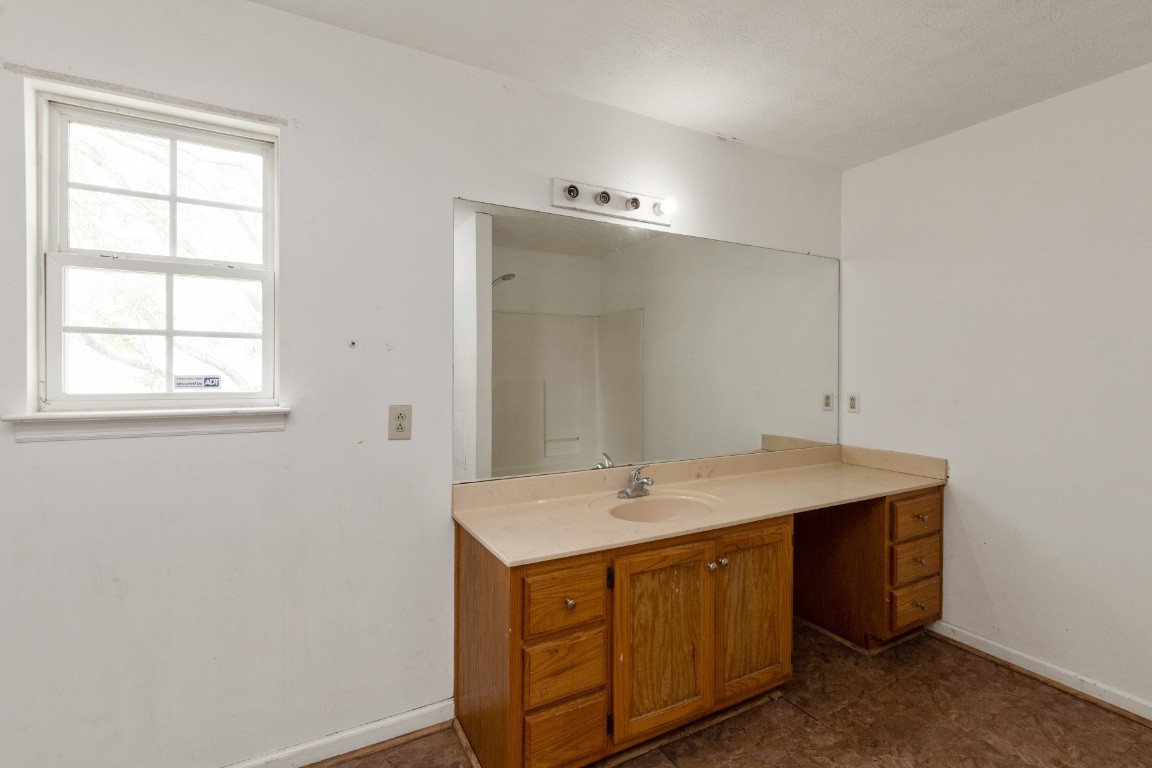 323 Bandera Lane Springfield, TN 37172 - Photo 12 of 33 a room with a sink cabinets and wooden floor