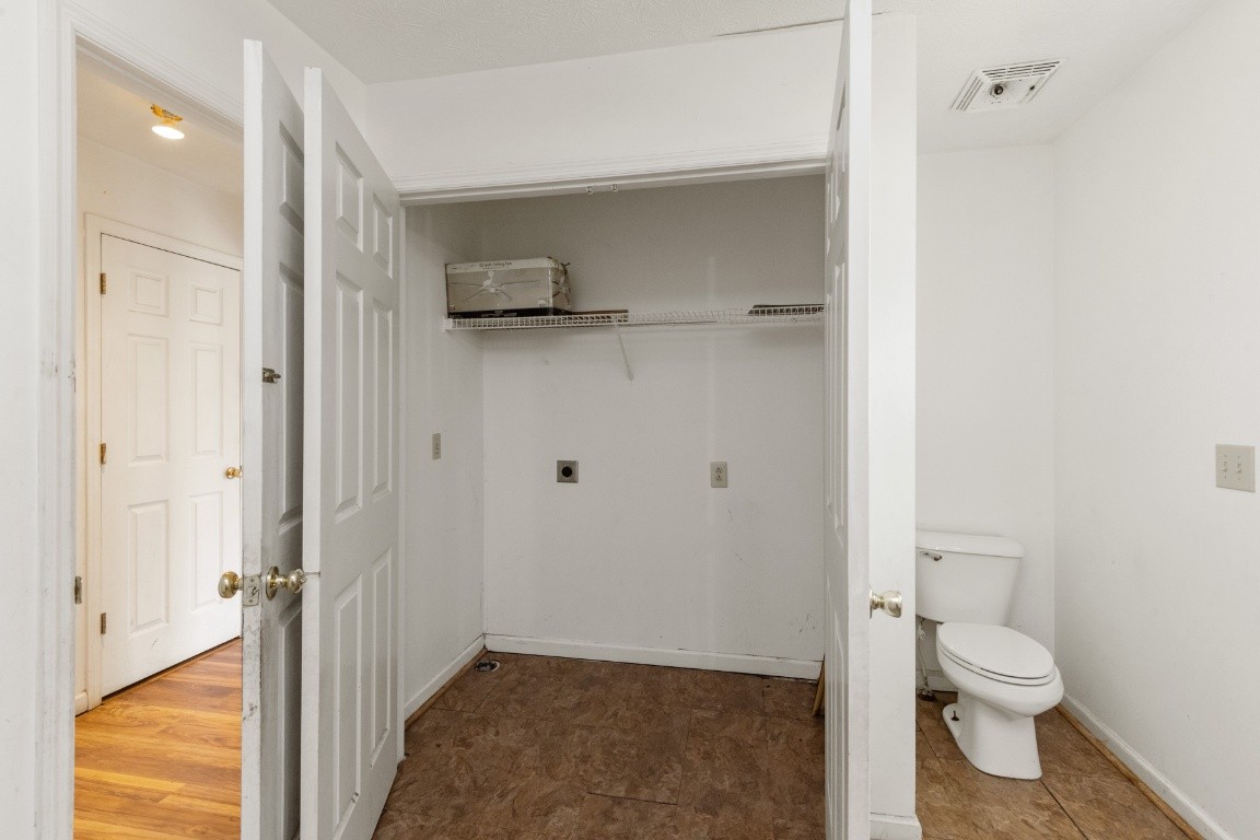 323 Bandera Lane Springfield, TN 37172 - Photo 14 of 33 a bathroom view of a toilet and a shower