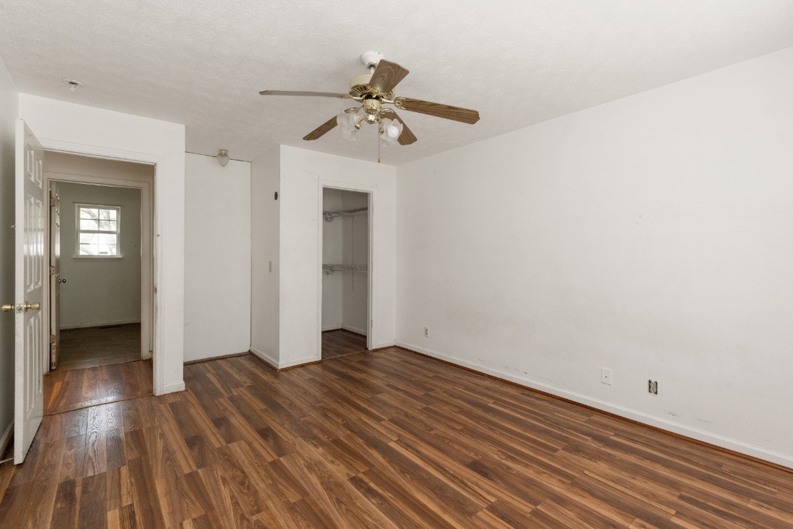 323 Bandera Lane Springfield, TN 37172 - Photo 16 of 33 a view of a livingroom with wooden floor and a ceiling fan