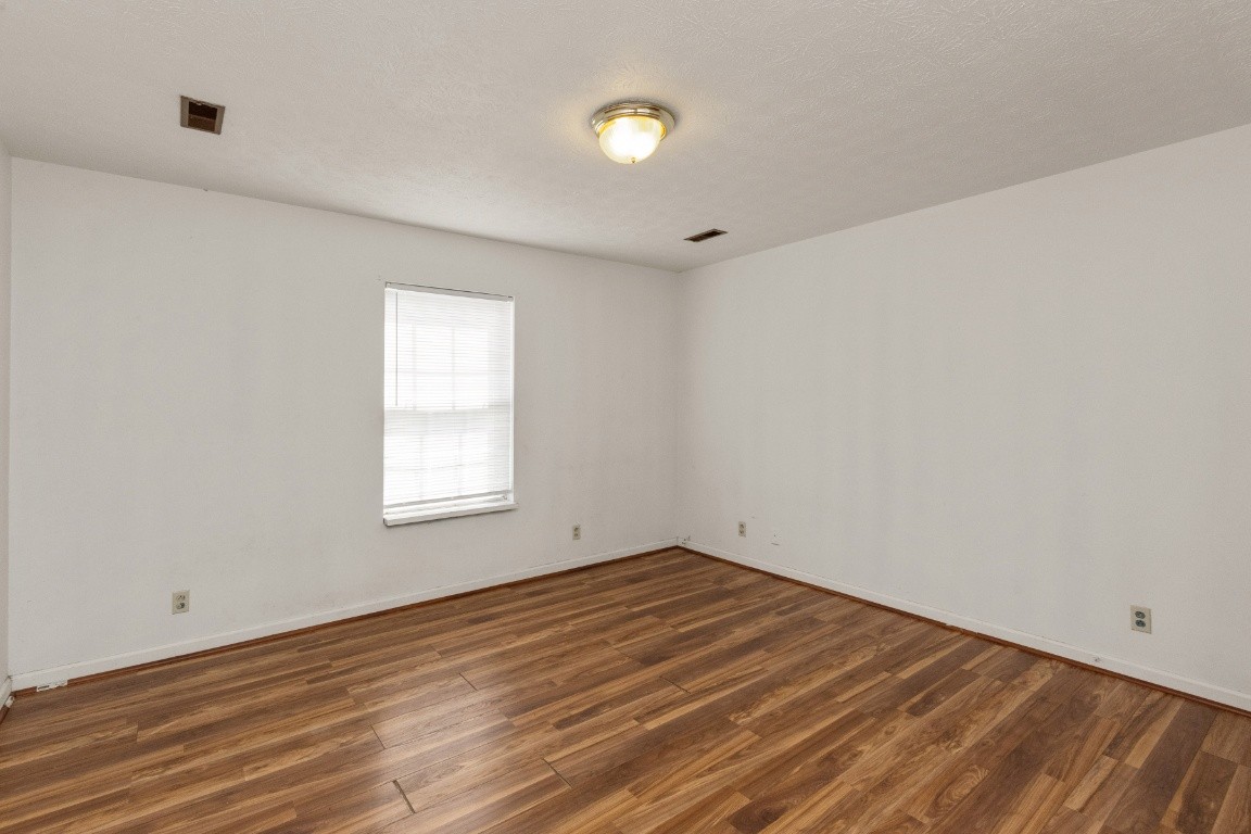 323 Bandera Lane Springfield, TN 37172 - Photo 18 of 33 a view of empty room with wooden floor and fan