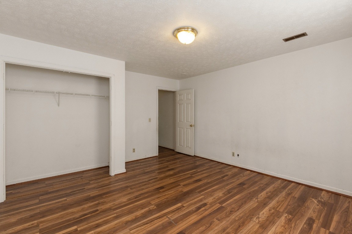 323 Bandera Lane Springfield, TN 37172 - Photo 20 of 33 a view of an empty room with wooden floor