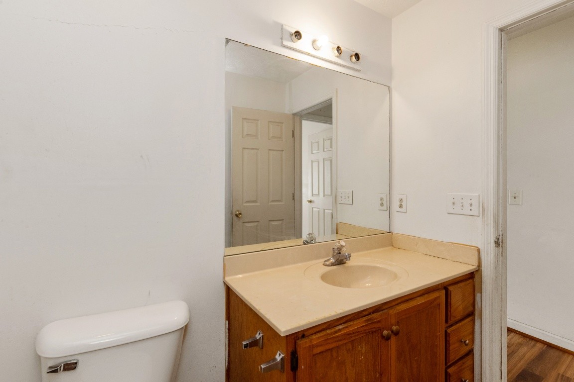 323 Bandera Lane Springfield, TN 37172 - Photo 22 of 33 a bathroom with a sink toilet and mirror