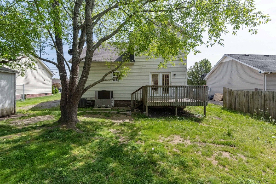 323 Bandera Lane Springfield, TN 37172 - Photo 30 of 33 a view of backyard with wooden fence and a large tree