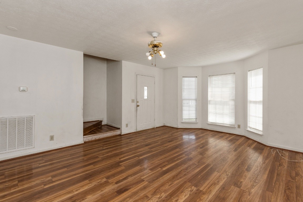 323 Bandera Lane Springfield, TN 37172 - Photo 5 of 33 wooden floor in an empty room with a window