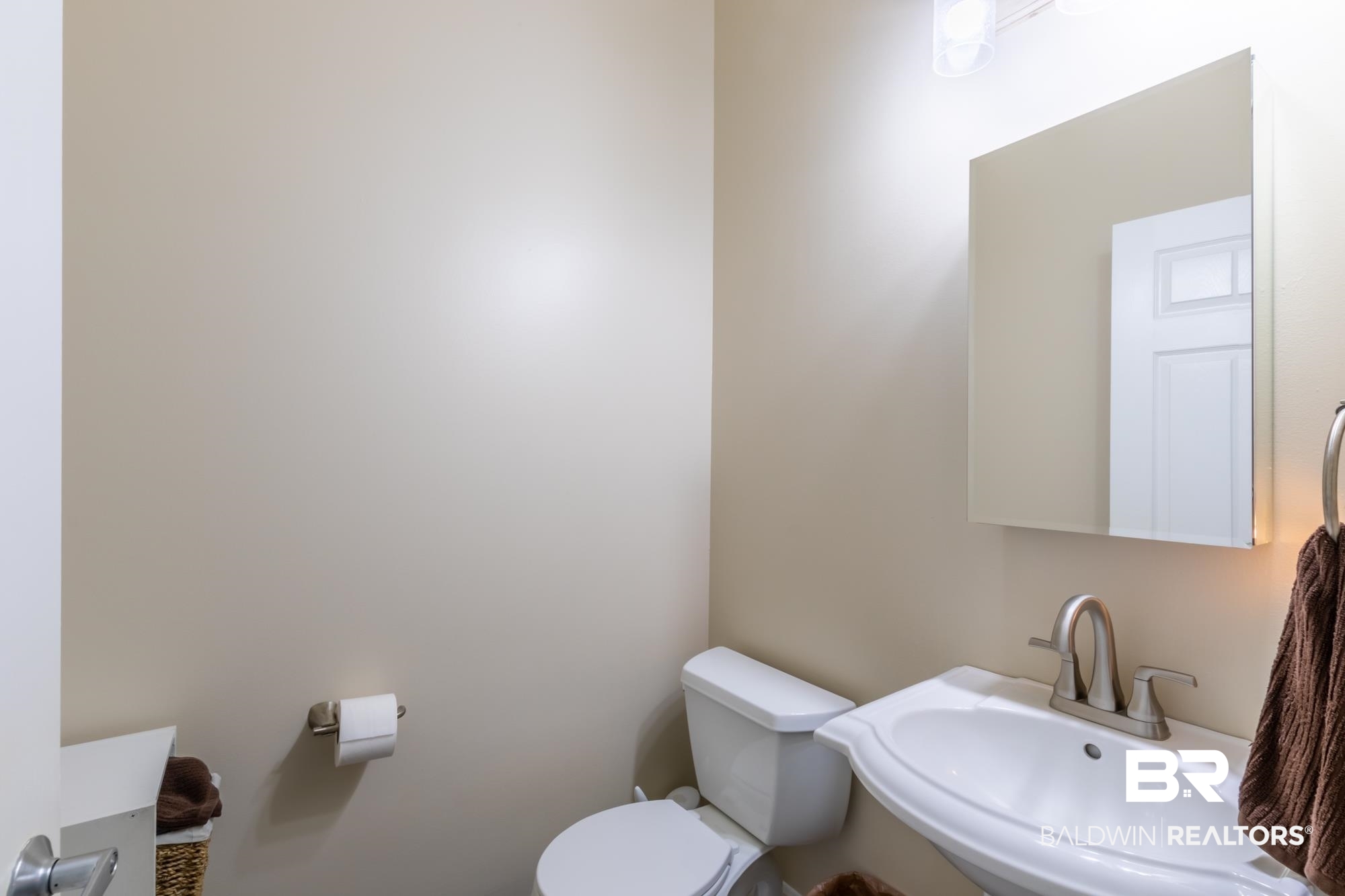 31043 Peninsula Drive Orange Beach, AL 36561 - Photo 20 of 50 Half Bath off of Living Area