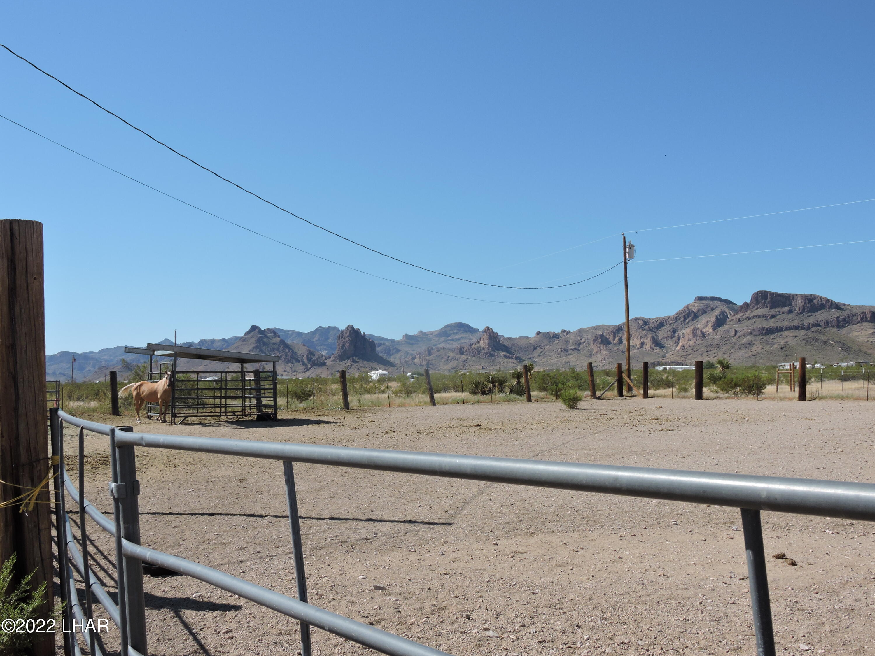 1566 South Elfrida Road Golden Valley, AZ 86413 - Photo 29 of 45 a view of a road with a ocean view