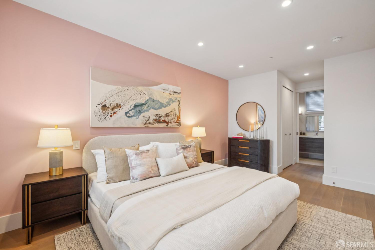 1533 Pacific Avenue San Francisco, CA 94109 - Photo 33 of 58 a bedroom with a large bed and a painting on the wall