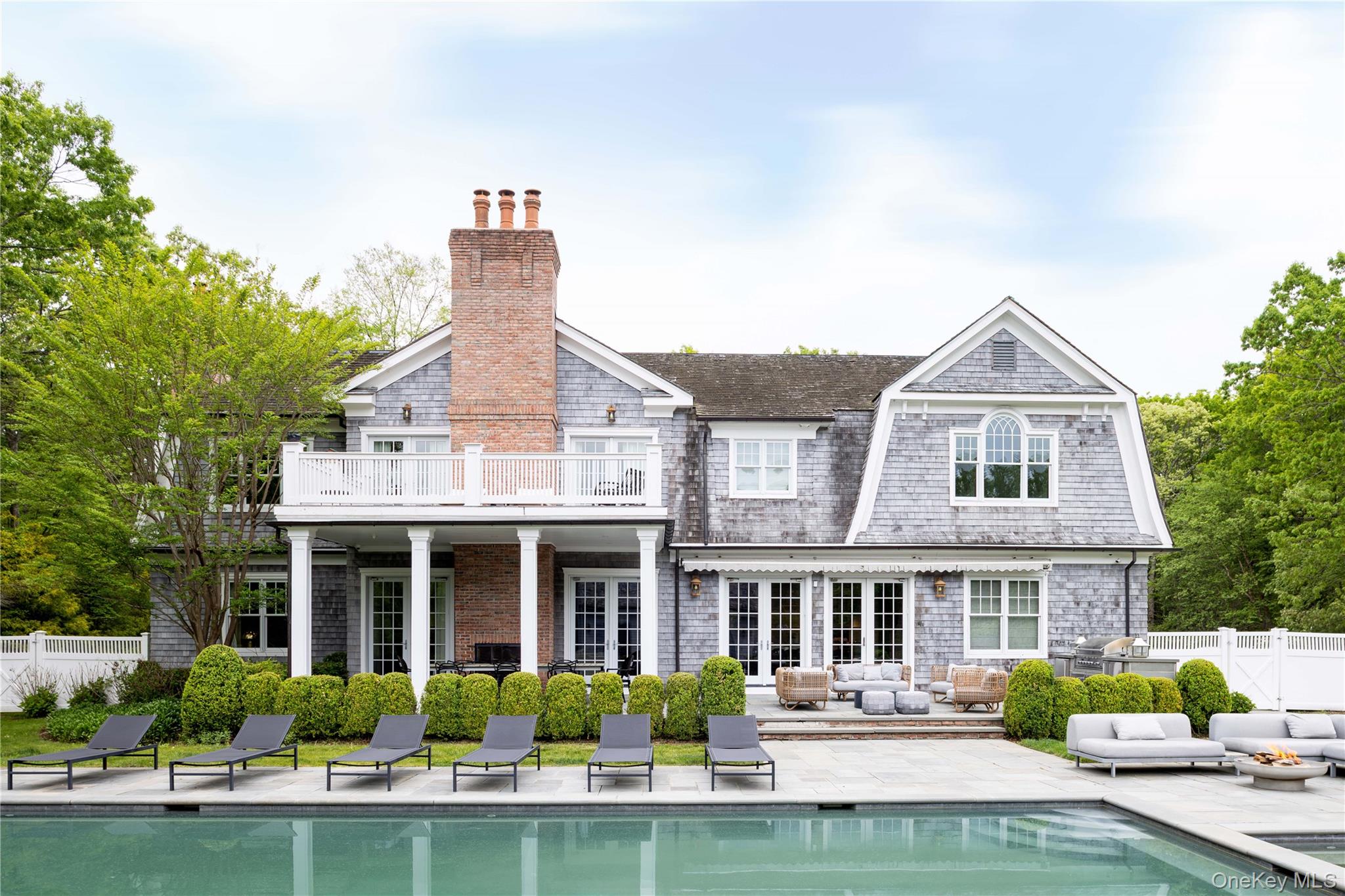 486 Middle Line Highway Bridgehampton, NY 11976 - Photo 3 of 25 a front view of a house with a yard